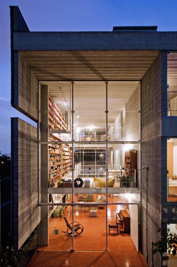 3 storey wall books creates privacy contemporary home 3 entry